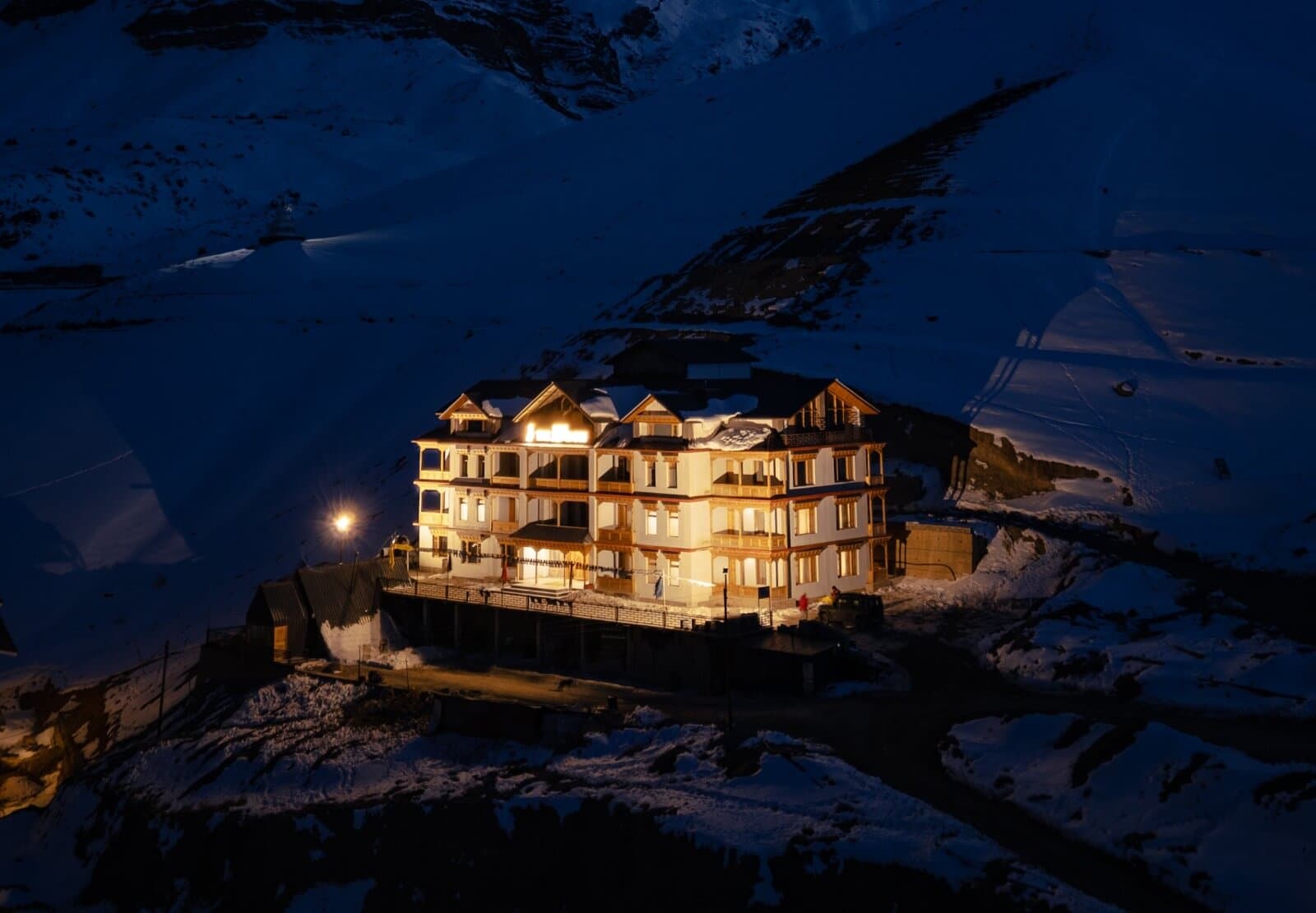 The Zambori building illuminated at night